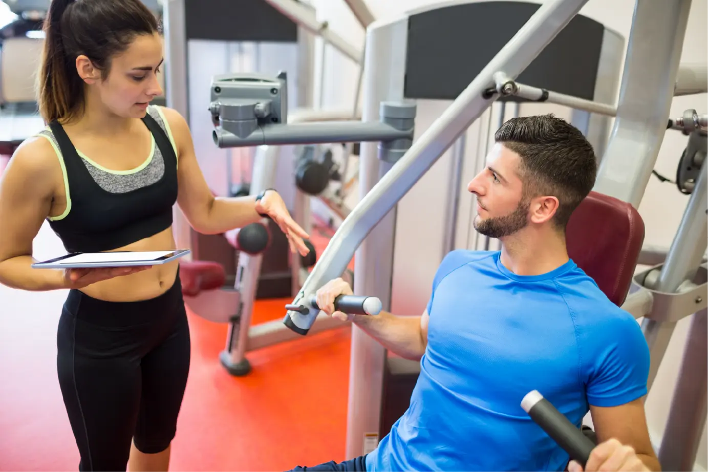 Customer receiving professional fitness support